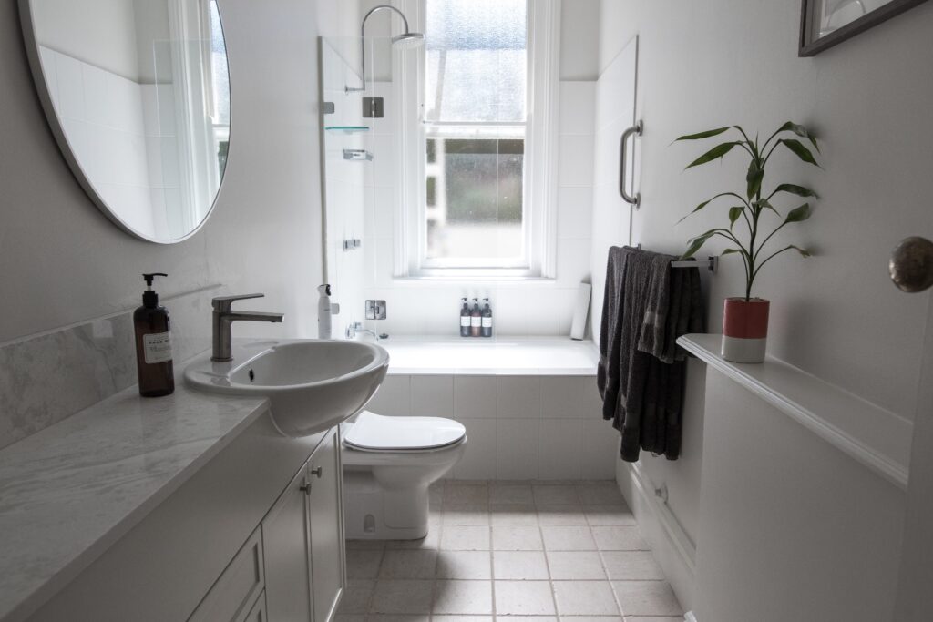 Small bathroom space with a window
