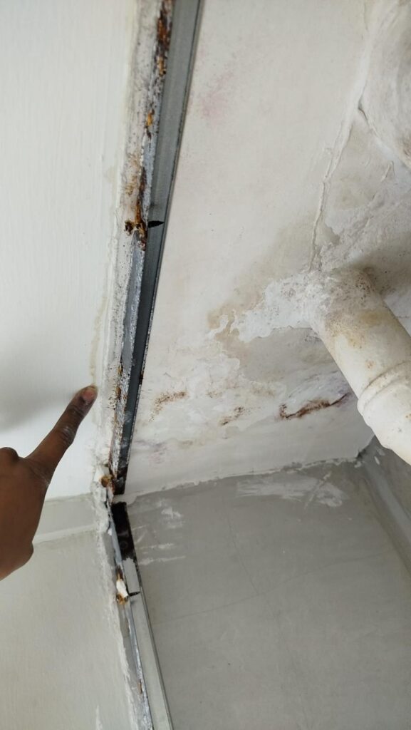 Example of water leaking between door gaps